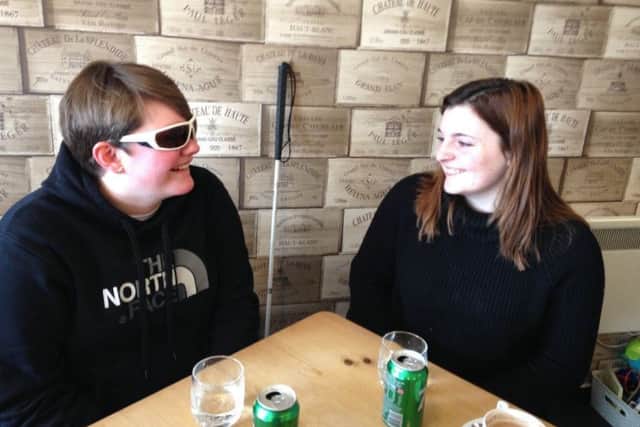 Pictured is My Guide volunteer Shannon with service user Amy.