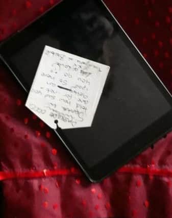 The iPad with note given to Leyland by Amy Mitchell, Robert Britton and the 'people of Boston'.