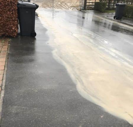 More pictures as the rainwater keeps flowing towards residential housing. EMN-180201-143653001