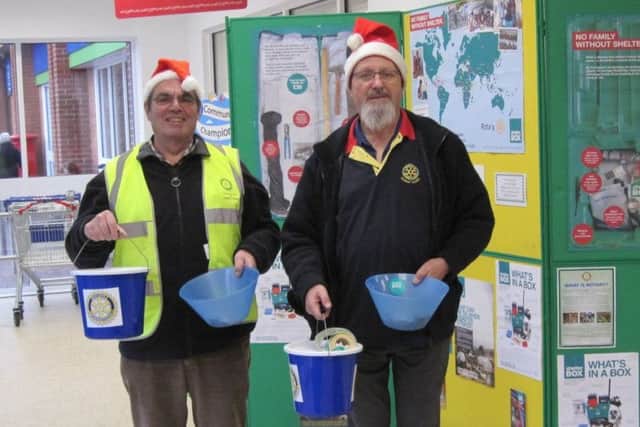 Rotarians Hugh Nott and John Moore at Market Rasen Co-op