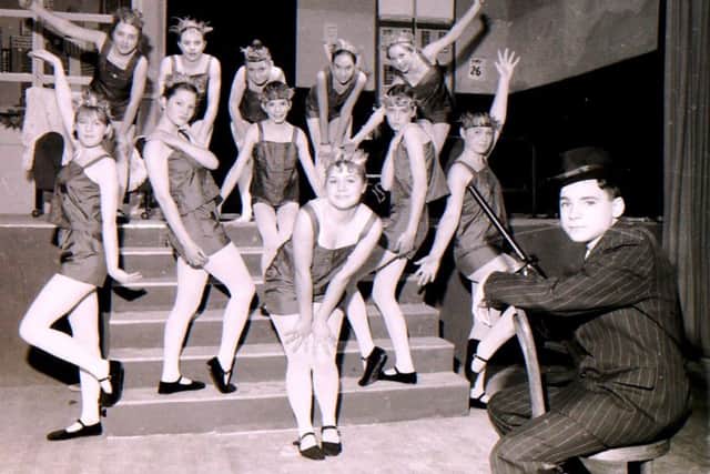 Bring on the dancing girls! The multi-talented cast of William Robertson School's production of Bugsy Malone in 1992. EMN-180301-172023001