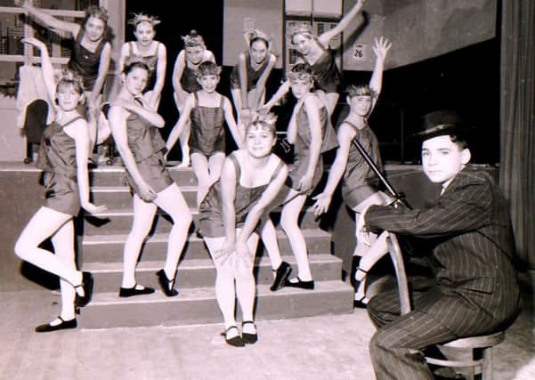 Bring on the dancing girls! The multi-talented cast of William Robertson School's production of Bugsy Malone in 1992. EMN-180301-172023001