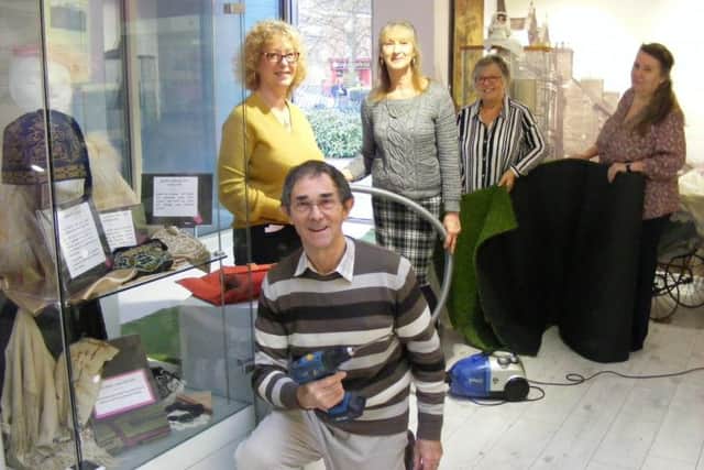 Putting the finishing touches to the refurbishments at Sleaford Museum. From left - Evelyne Bryant (secretary), David Marriage (chairman), Jacqui Cleaver (curator), Janice Smith (team member) and Heather Jenvey (archivist). EMN-180501-121556001