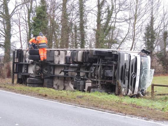 Recovery crews work on the overturned lorry near Aswarby and Swarby.
