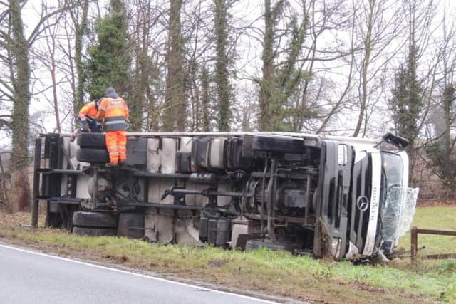 Recovery crews work on the overturned lorry near Aswarby and Swarby.