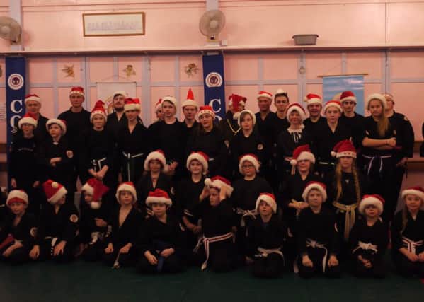 Club members wore Santa hats for their recent presentation evening.