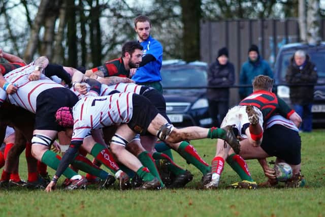 Scrum-half Jack Noquet catches the Paviors number eight in possession at a scrum EMN-180801-083450002