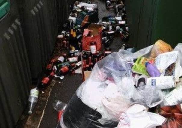 Some of the rubbish left at the bottle bank