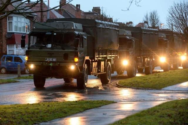 The military arriving in Skegness in following fears of a storm surge in January last year. ANL-180801-112127001