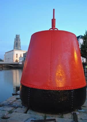 The existing buoy at Custom House Quay in Boston.