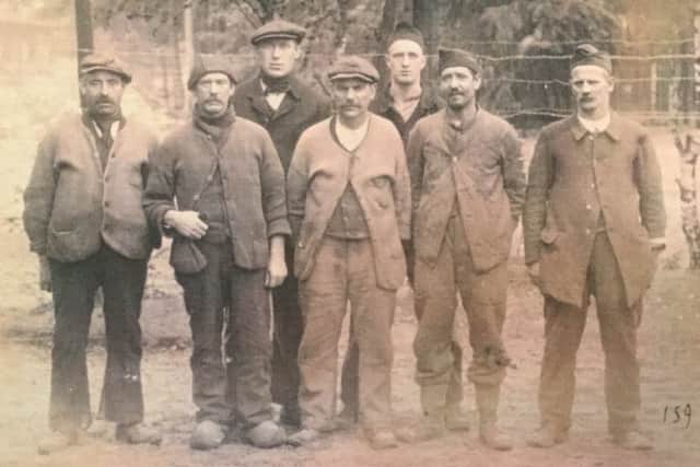 Prisoners of War pictured at their internment camp.
