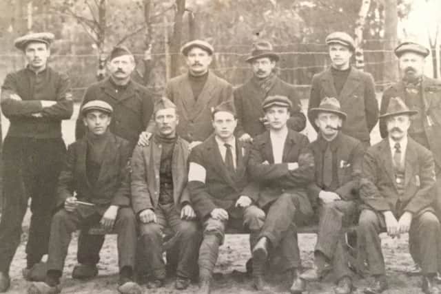 More Boston fishermen interned at a Prisoner of War camp.
