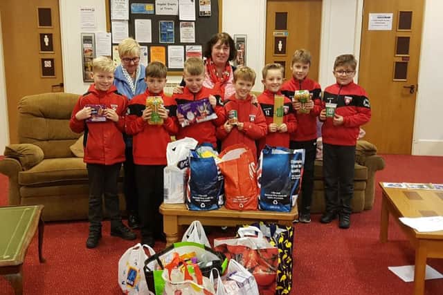 Youngsters from Louth Old Boys have been busy off the pitch supporting the food larder.