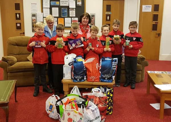 Youngsters from Louth Old Boys have been busy off the pitch supporting the food larder.