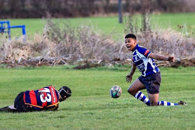 Kyle Turley celebrates his try. Photo: David Dales.