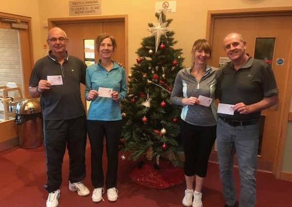 Mixed winners Richard Tupper and Denise Priestley (left) with runners-up Robert Bonser and Paula Smith.