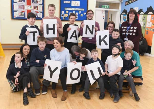 Pupils and staff at The John Fielding Special School, Boston, celebrate hitting fundraising target.