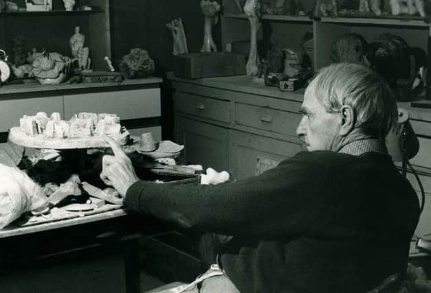 Henry Moore in his studio at Perry Green with Stone Maze: Project for Hill Monument c.1968-72. Photo: Henry Moore Archive (Reproduced by permission of The Henry Moore Foundation).
