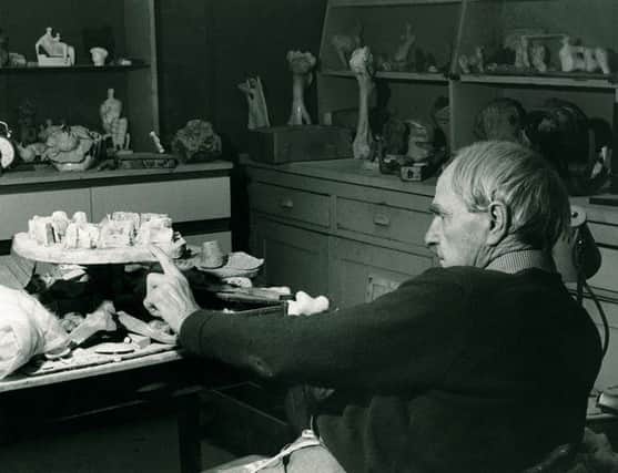 Henry Moore in his studio at Perry Green with Stone Maze: Project for Hill Monument c.1968-72. Photo: Henry Moore Archive (Reproduced by permission of The Henry Moore Foundation).