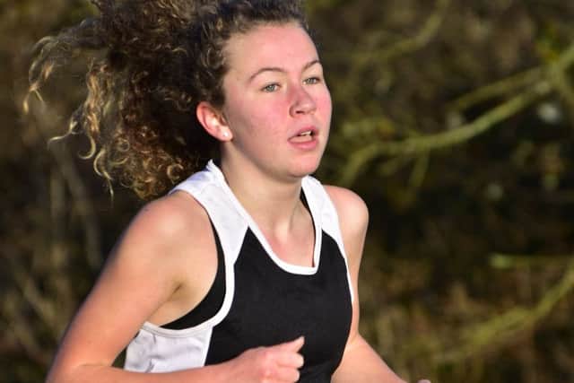 Devon Lowe on her way to second place in the Year 10/11 girls race EMN-181101-101125002