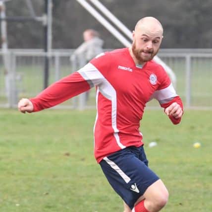 Railway Athletic (blue) v Ruskington Rovers (red). Ash Farmer.