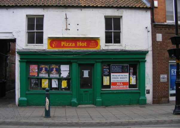 Former Mess of the Year, the old Pizza Hot takeaway premises, judged by Sleaford and District Civic Trust, will get a spruce up this week by the district council. EMN-180115-095338001
