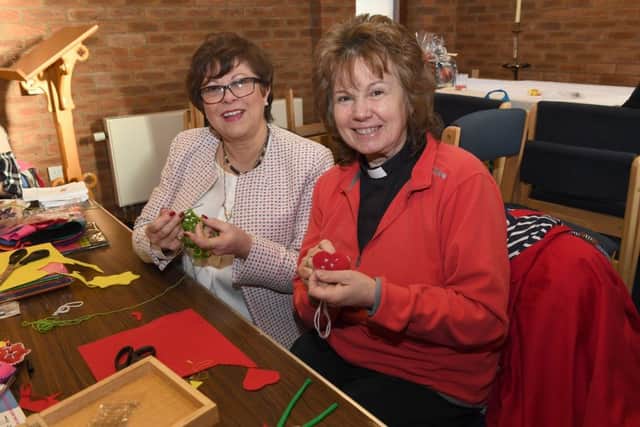 International Day at St Christophers Church on Fenside Road. L-R Jayne Rush - mayoress and Jane Robertson trying the crafts. EMN-180115-112142001