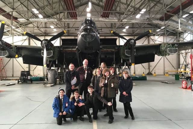 The winning team got up close with aircraft during a trip to RAF Coningsby. EMN-180115-121847001