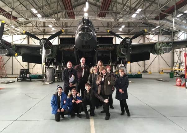 The winning team got up close with aircraft during a trip to RAF Coningsby. EMN-180115-121847001