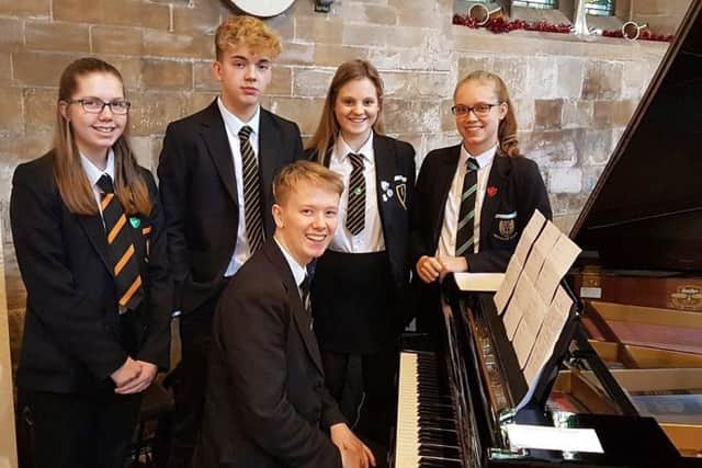 A group of Year 11 pupils who performed at the concerts. EMN-180115-145830001