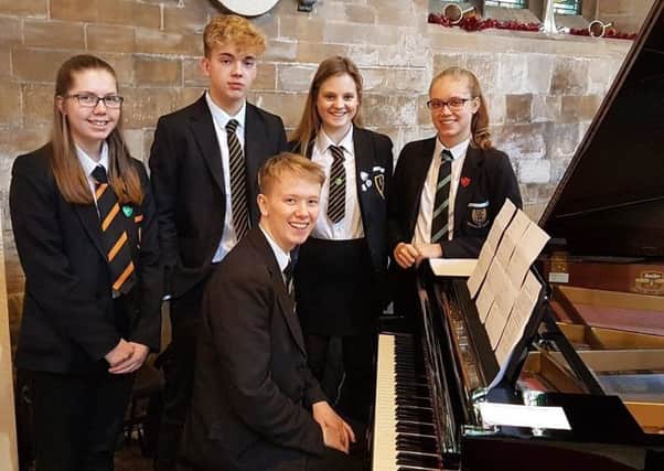 A group of Year 11 pupils who performed at the concerts. EMN-180115-145830001