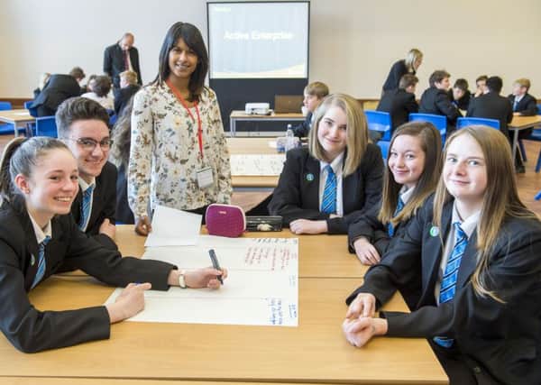 Pictured is: Tash Moore with pupils Trinity Ianson, Charlie Ledgeway, Lily Williams, Jenny-Kay Parker and  Shona Askwith.