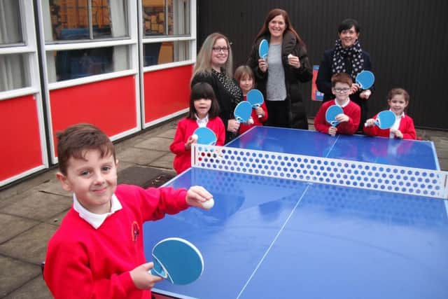 The PTFA of Leasingham St. Andrews presented the school with outdoor table tennis tables.