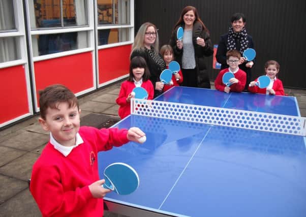 The PTFA of Leasingham St. Andrews presented the school with outdoor table tennis tables.