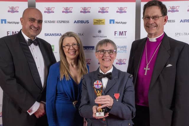 Meg Atkinson, third from left, receiving her award.