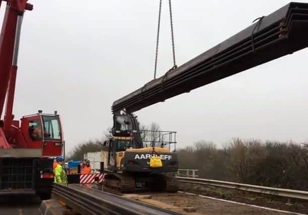 Metal piles to be used to strengthen the embankment on the A17 at Sleaford. EMN-180117-110939001