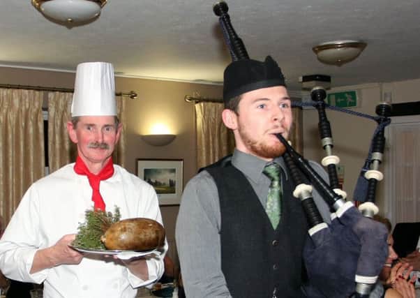 Piping in of the haggis. EMN-180119-143059001