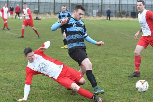 Leverton Res (blue) v Digby FC (red). Aaron Smith (blue), Tom Brearley (red).