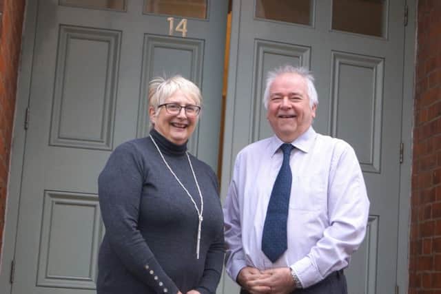 Outgoing clerk Helen Pitman and new clerk Jim Hanrahan at the entrance to the newly created town clerk's office in Caistor Town hall EMN-180122-095425001