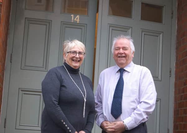 Outgoing clerk Helen Pitman and new clerk Jim Hanrahan at the entrance to the newly created town clerk's office in Caistor Town hall EMN-180122-095425001