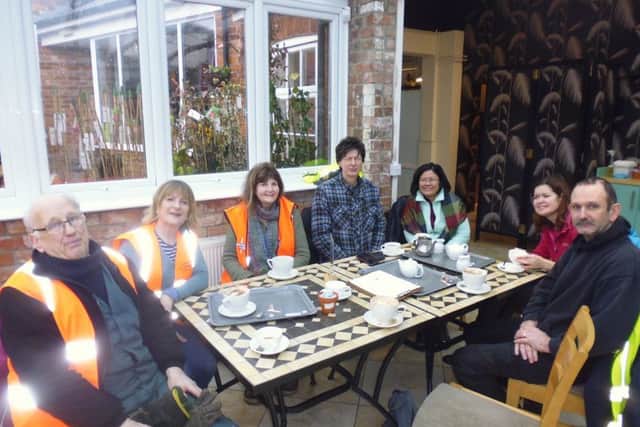 A welcome and warming drink after a morning tidying the town's verges EMN-180122-123804001