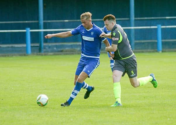 Cup wins, such as Towns victory over Hednesford, with Jordan Nuttell pictured in action, have left the club playing catch up.