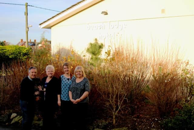 Hotel owners Steve and Michele Robson with employee Lauren Warner and manager Cheryl Cockram.