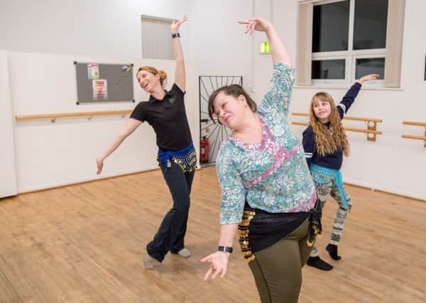 Belly dancing classes with Emma Giles owner of Zest dance and fitness, Marie Betts, instructor, and  Lili Betts age 11. EMN-180126-123935001
