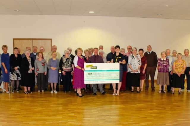 Dancing With KCB present a cheque for £1,200 to LIVES First Responders.
