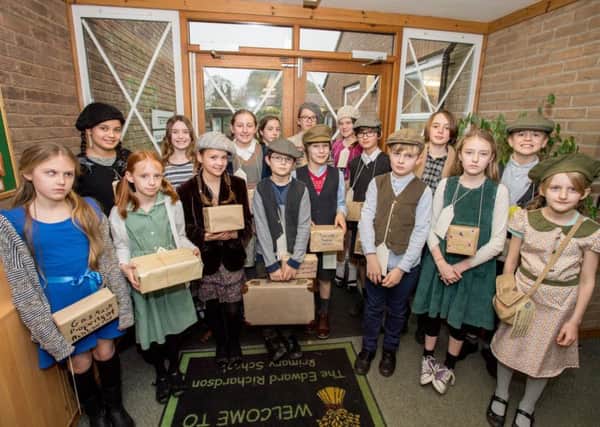 Pupils  from the school dressed as evacuees from the Second World War. Picture: John Aron.