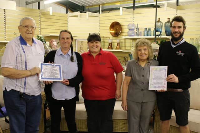 Arthur Eaton with Woodthorpe staff members Paula Peach and Louise White. Lillan Eaton (right) is pictured with staff member Adam Arrowsmith.