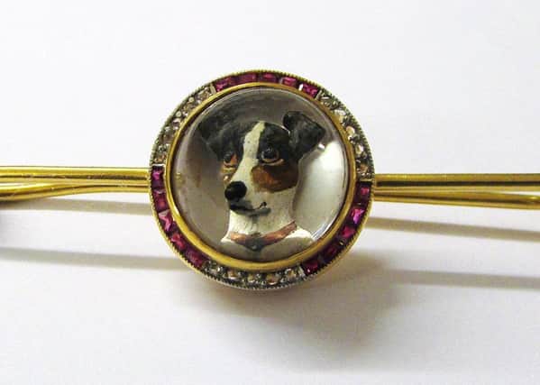Diamond and ruby encrusted Jack Russell brooch. EMN-180125-092123001