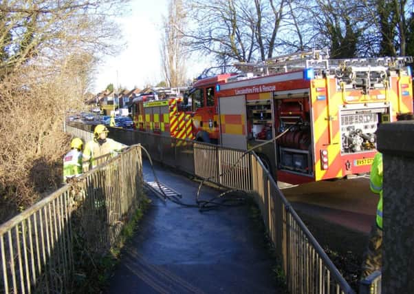 Fire crews at the scene of the fire under Galley Hill railway bridge in Sleaford. EMN-180125-111554001