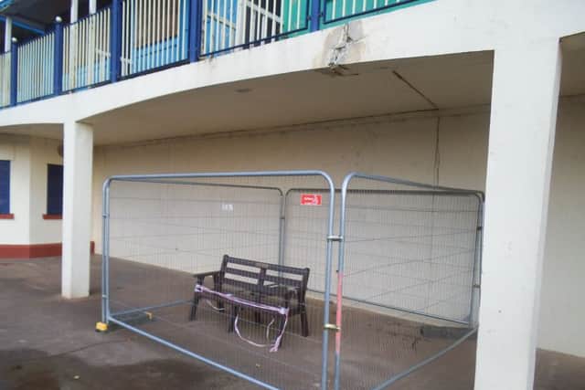 Some of the safety fencing put around one of the damaged sections.